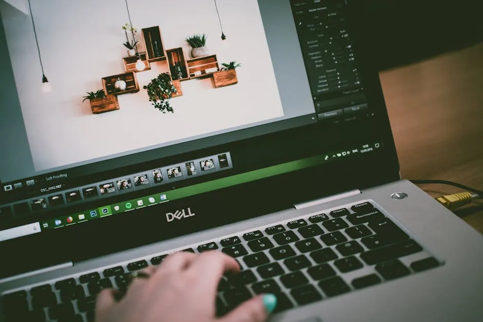 لابتوب Dell XPS يعمل عليه مطور مع شاشة عالية الدقة وبرنامج تحرير